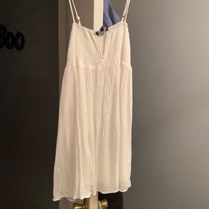 White dress, never worn before, still has the tags on it